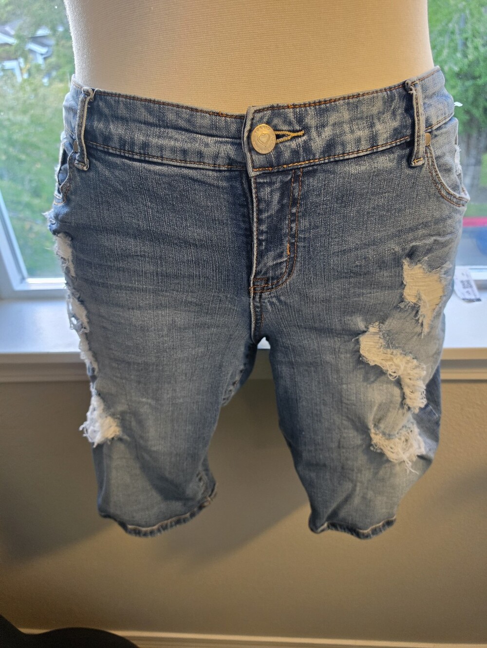 torrid light denim shorts with orange contrast stitching